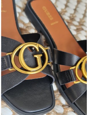 Mules Guess cuir Symo noires avec logo en métal doré